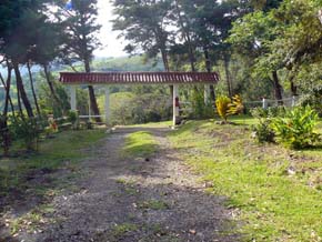 The entrance to the lot driveway.